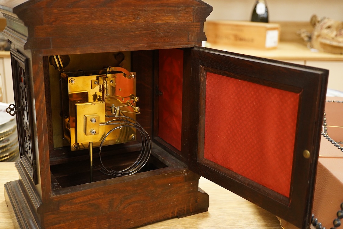A mahogany 19th century German two train mantel clock, striking on two coiled gongs, 41cm high.